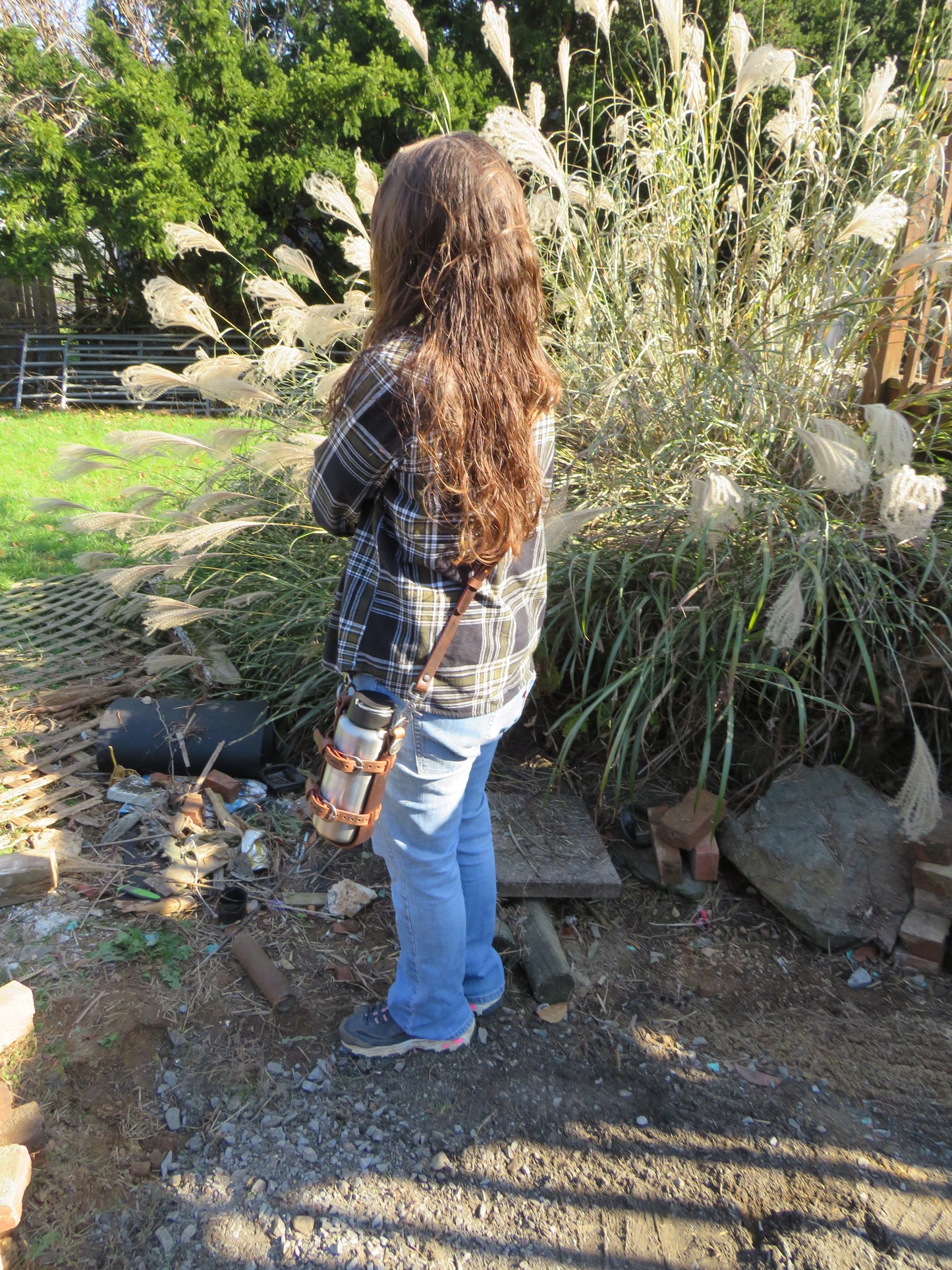 Adjustable Full Grain leather water bottle carrier with shoulder strap