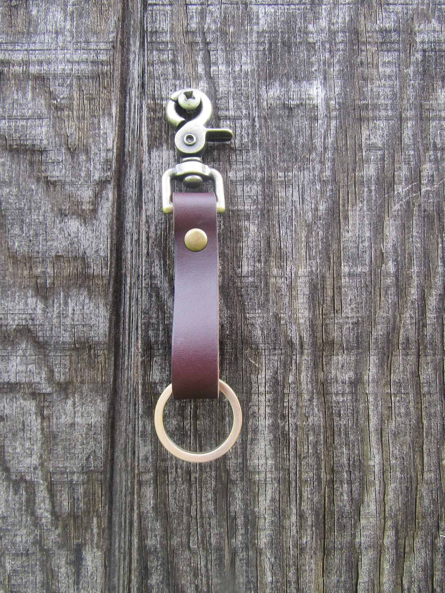 Handmade Dark Brown bridle Leather keychain with antique brass finish keyring and snap.