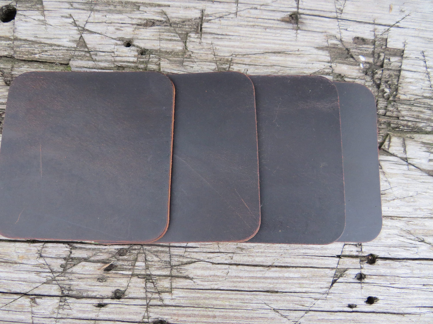 Ships today!! Set of 4 Full Grain Leather coasters, finish them your way, or use them like this custom coasters make your own leather