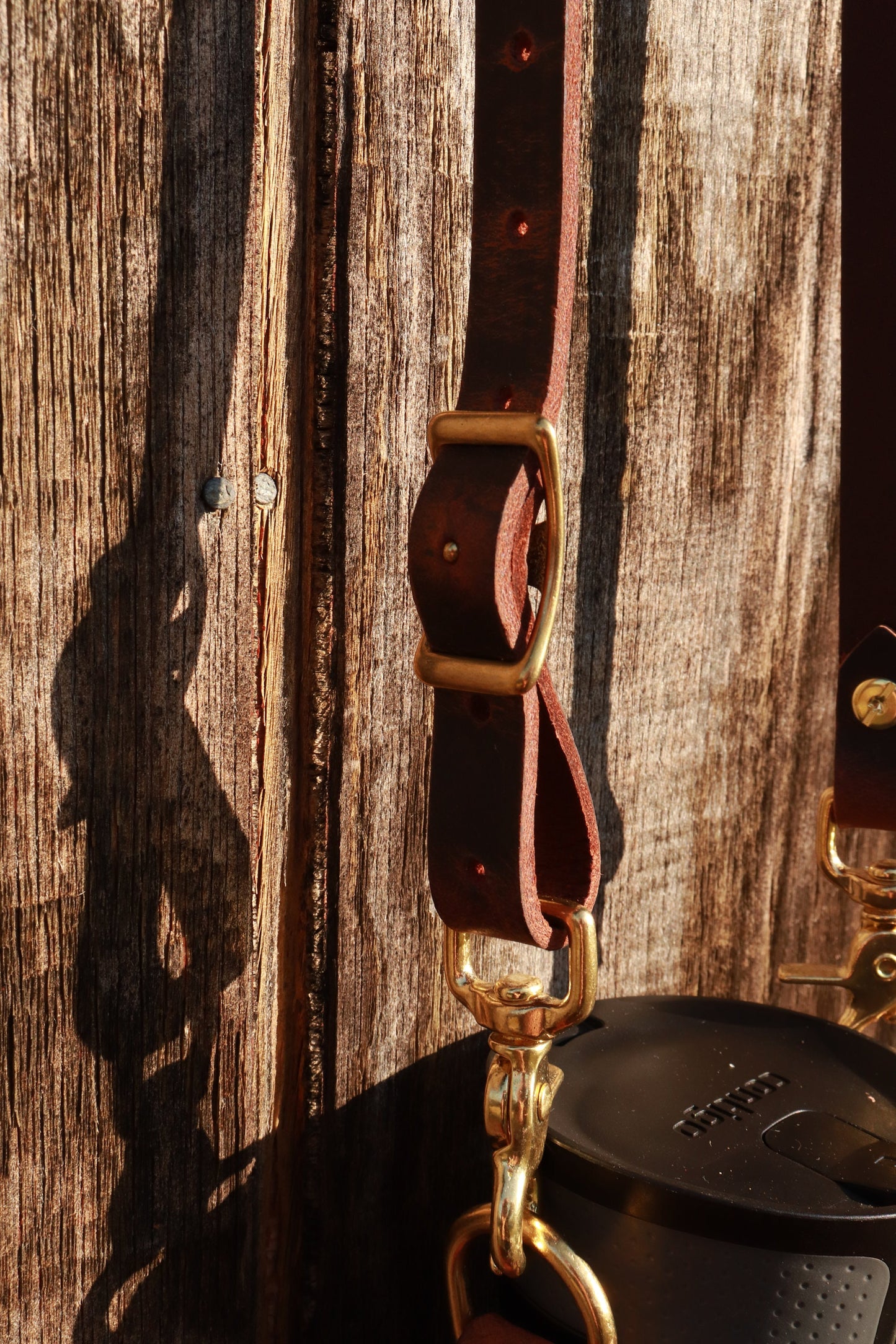 Adjustable Full Grain Water Buffalo leather water bottle carrier with shoulder strap,can be made to fit any bottle, handmade, custom leather