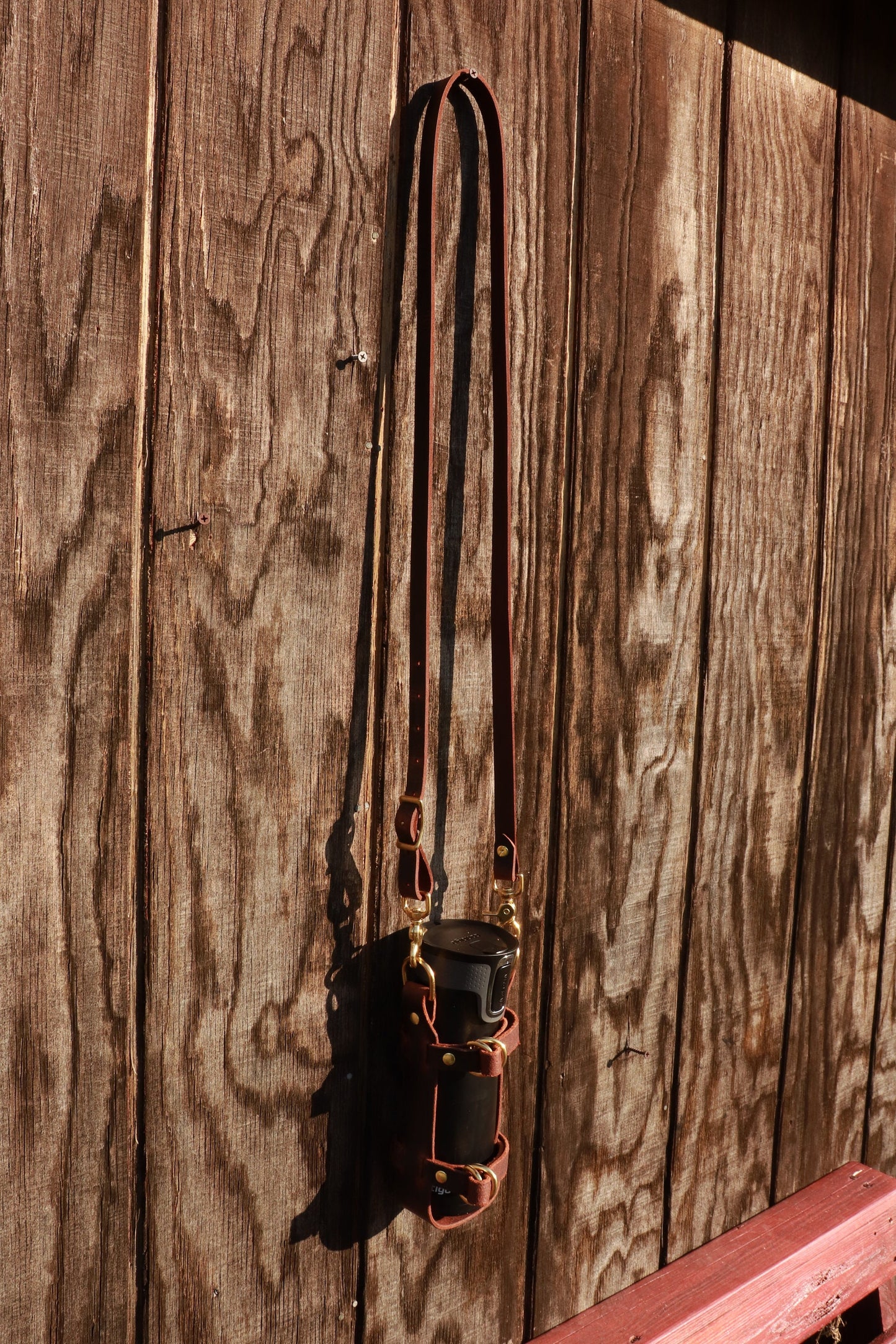 Adjustable Full Grain Water Buffalo leather water bottle carrier with shoulder strap,can be made to fit any bottle, handmade, custom leather