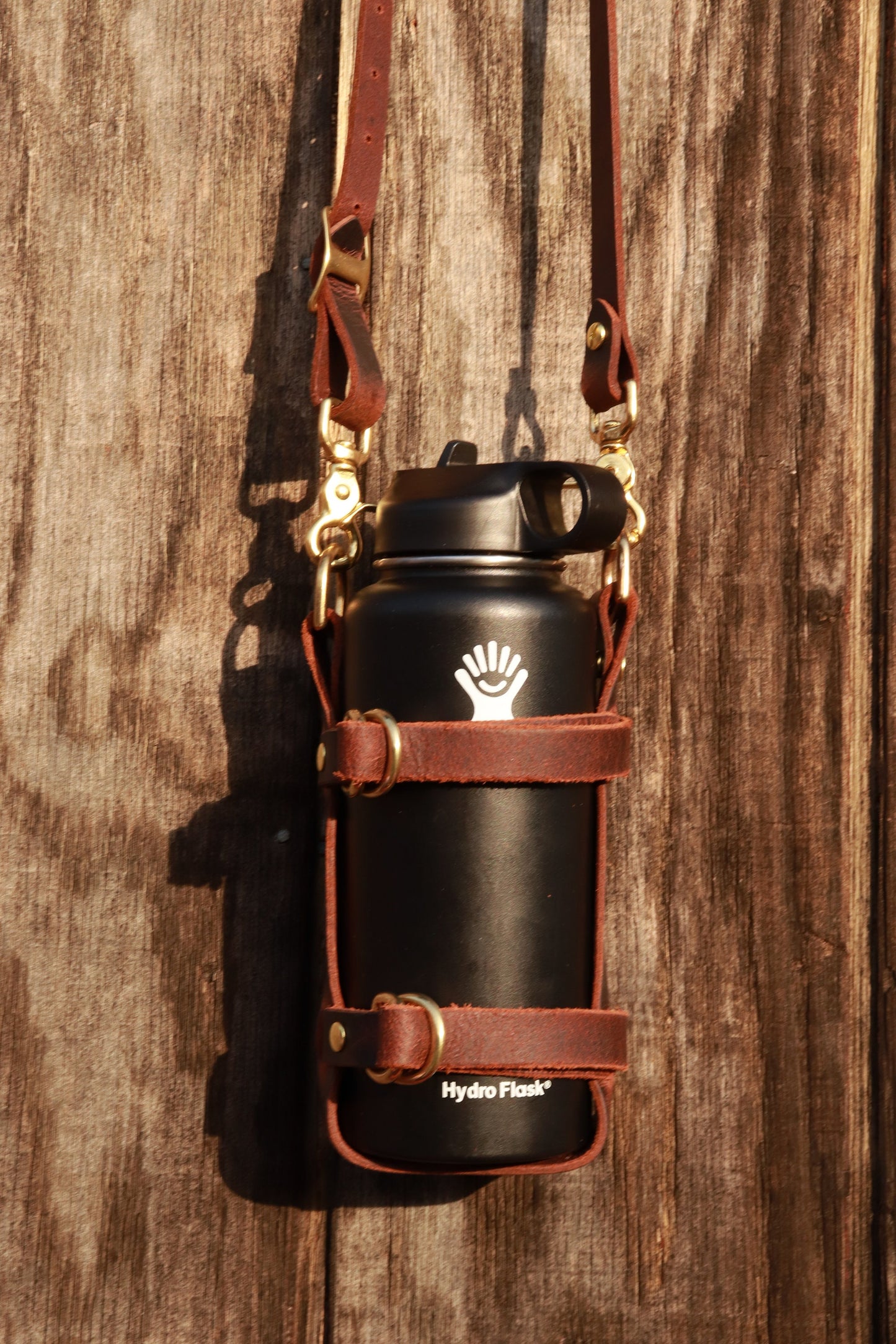 Adjustable Full Grain Water Buffalo leather water bottle carrier with shoulder strap,can be made to fit any bottle, handmade, custom leather