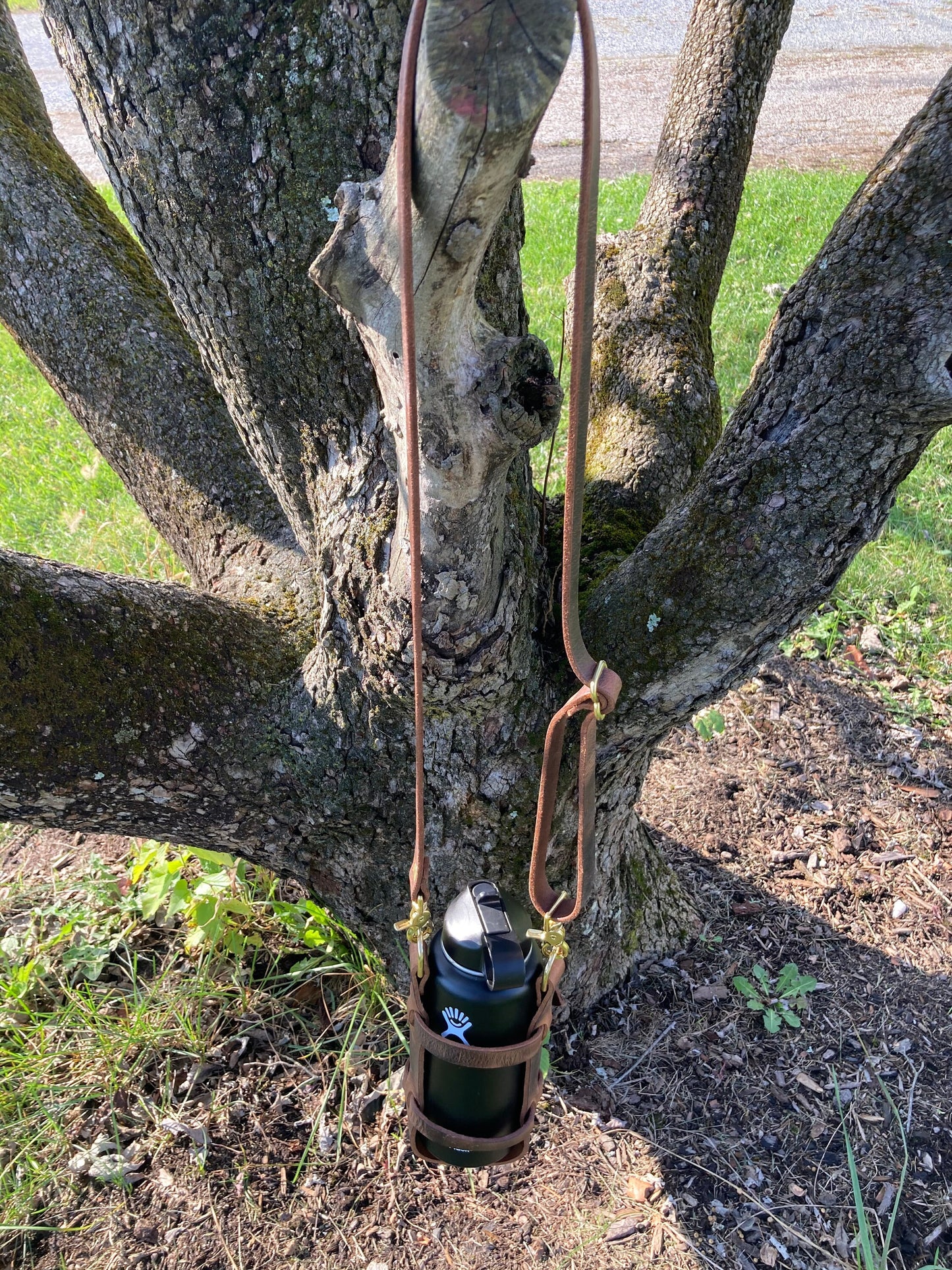 Adjustable Full Grain Water Buffalo leather water bottle carrier with shoulder strap