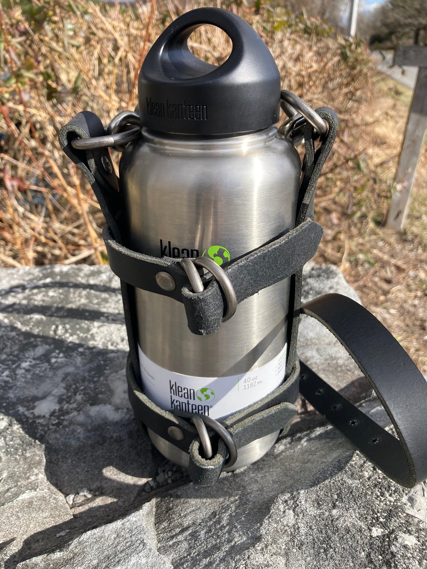 Adjustable Full Grain Black Water Buffalo leather water bottle carrier with shoulder strap