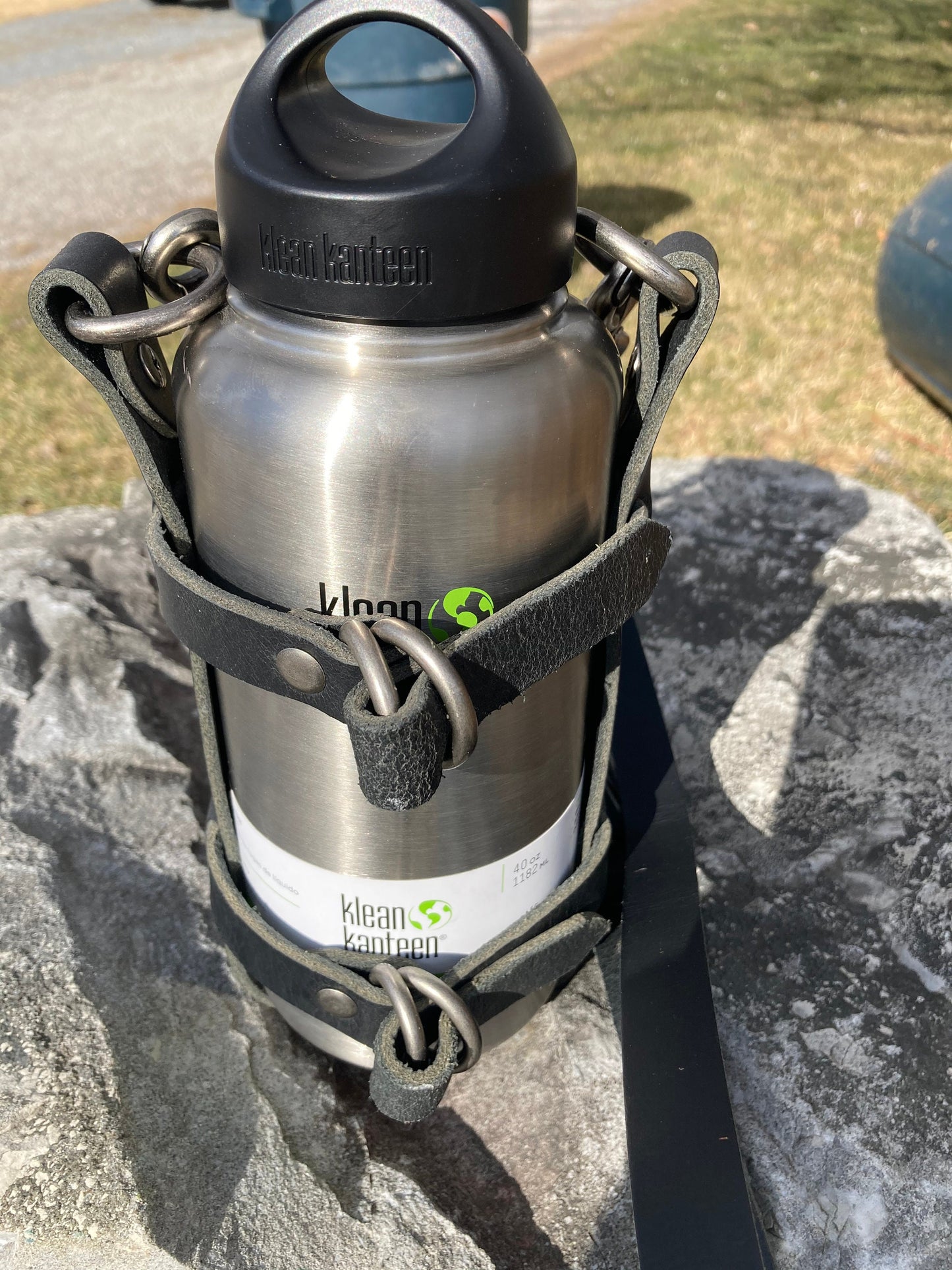 Adjustable Full Grain Black Water Buffalo leather water bottle carrier with shoulder strap