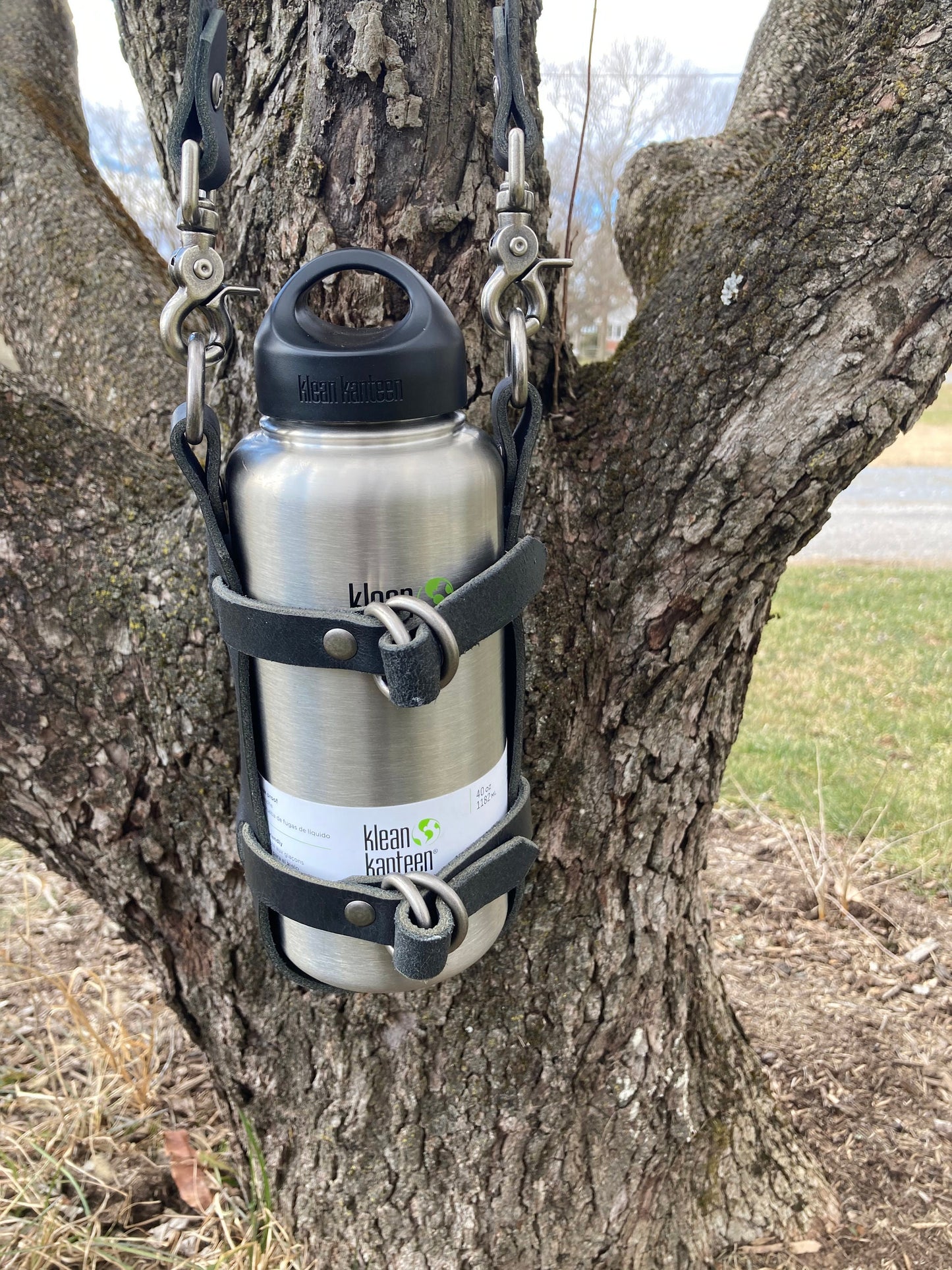 Adjustable Full Grain Black Water Buffalo leather water bottle carrier with shoulder strap