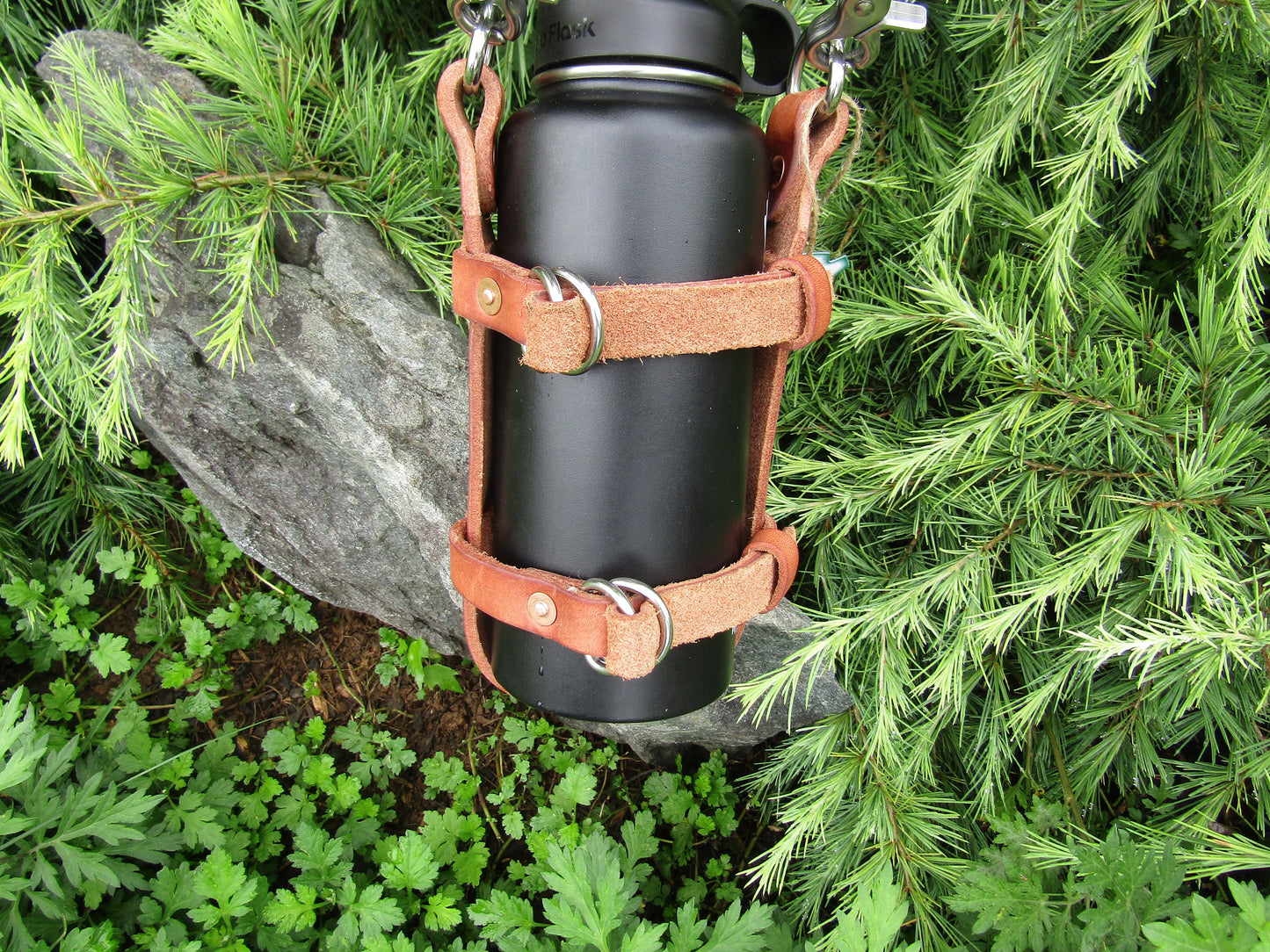 Adjustable Hermann Oak harness leather water bottle carrier with shoulder strap,