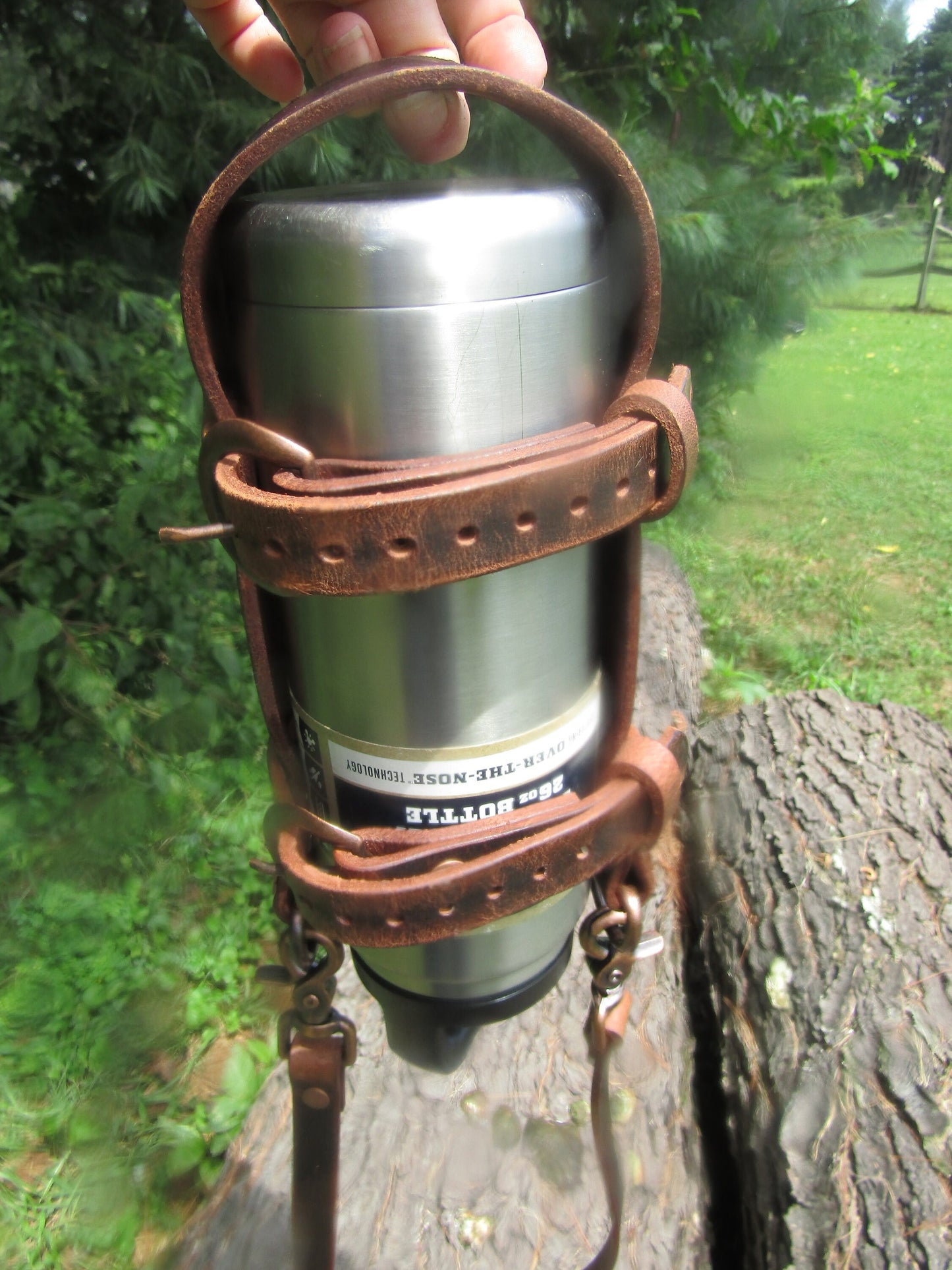 Adjustable Full Grain Water Buffalo leather water bottle carrier with shoulder strap, copper finish conchos