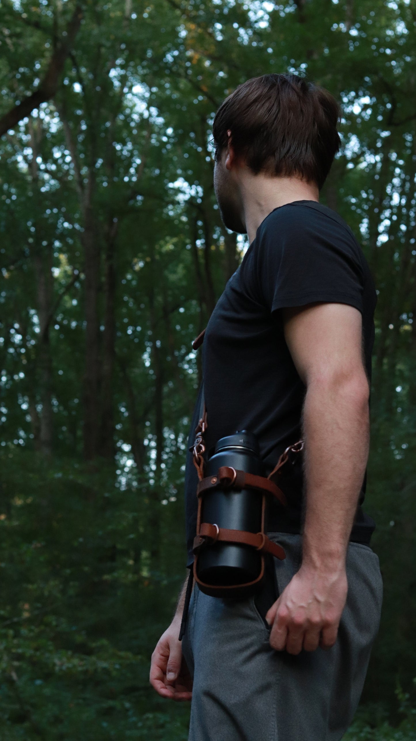 Adjustable Full Grain Water Buffalo leather water bottle carrier with shoulder strap, antique copper hardware, can be made to fit any bottle