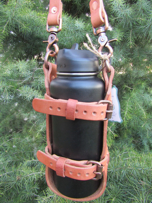 Adjustable Hermann Oak harness leather water bottle carrier with shoulder strap, antique copper finish hardware