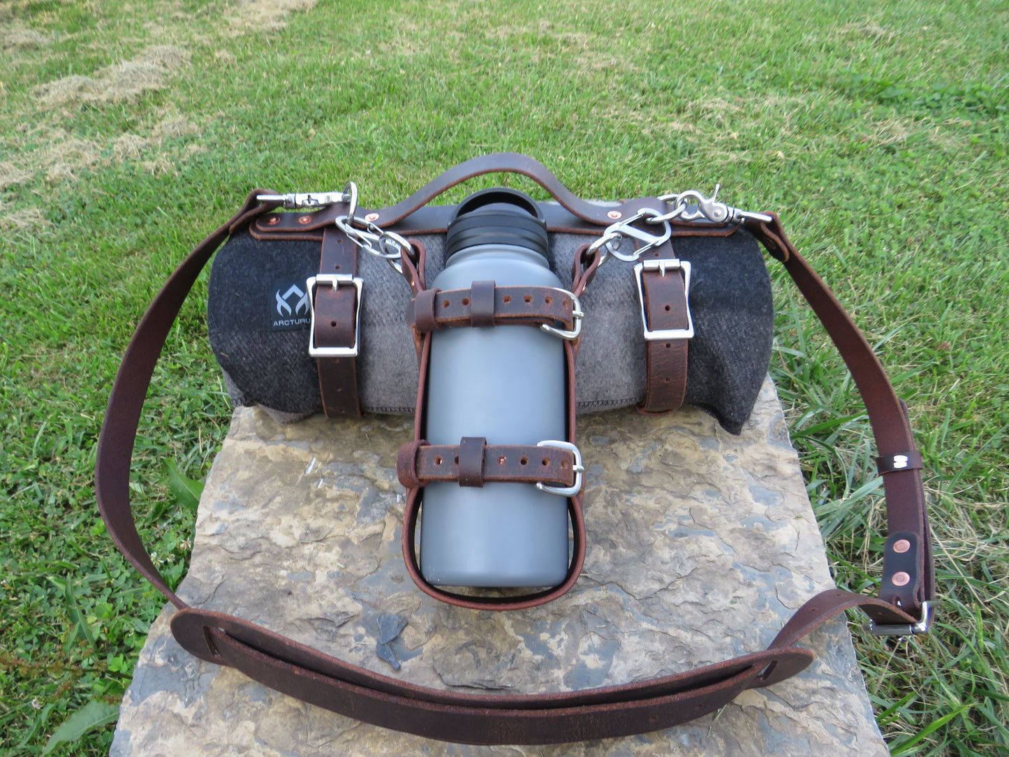 Hand made Crazy Horse Water Buffalo leather blanket carrier with matching water bottle carrier with wool blanket and bottle