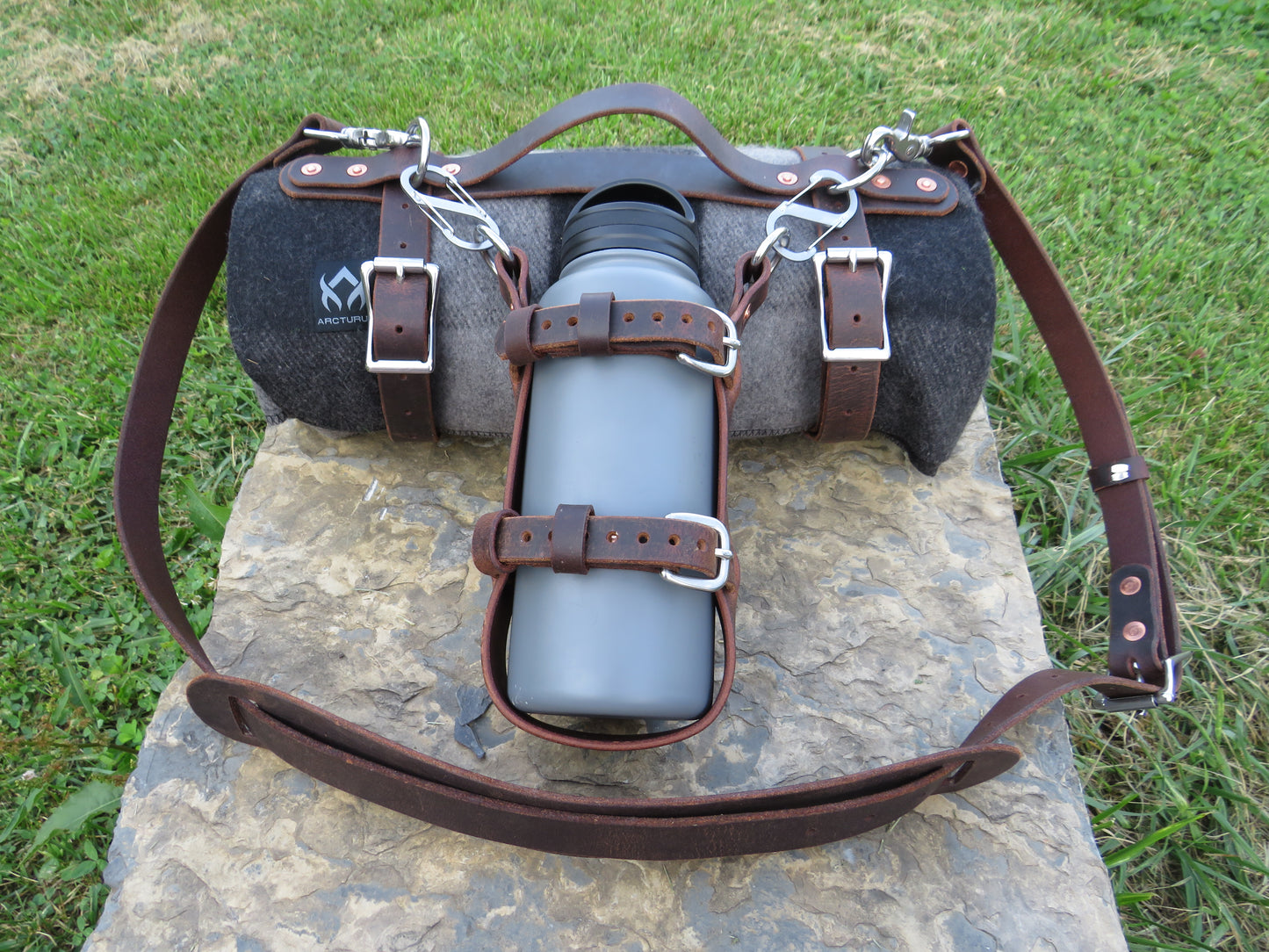 Hand made Crazy Horse Water Buffalo leather blanket carrier with matching water bottle carrier with wool blanket and bottle