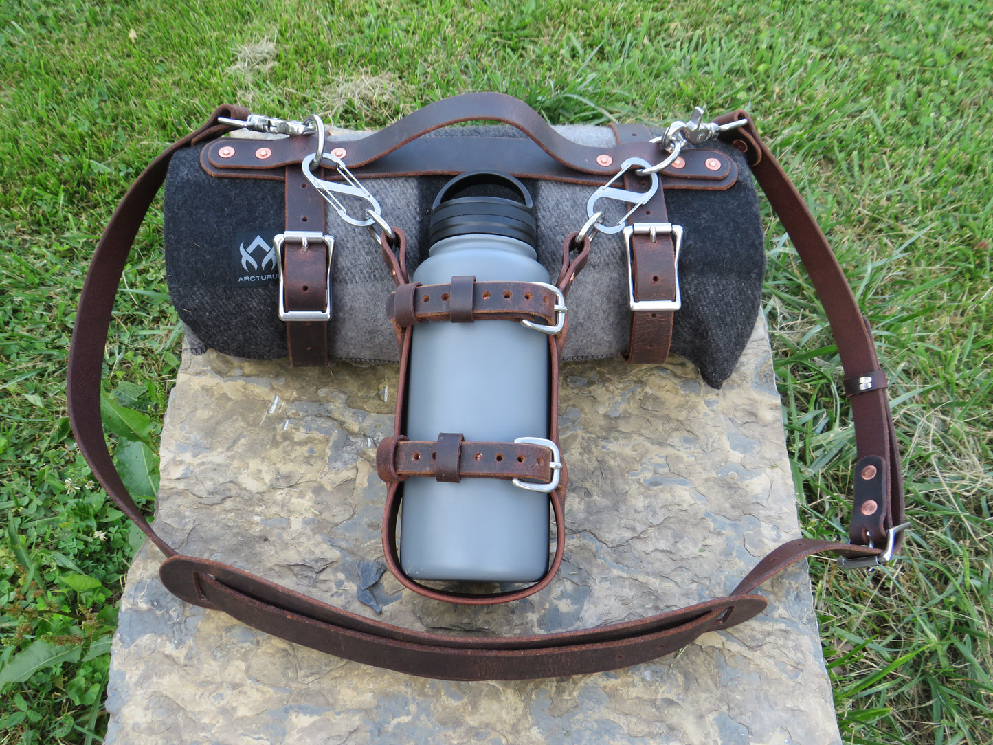 Hand made Crazy Horse Water Buffalo leather blanket carrier with matching water bottle carrier with wool blanket and bottle