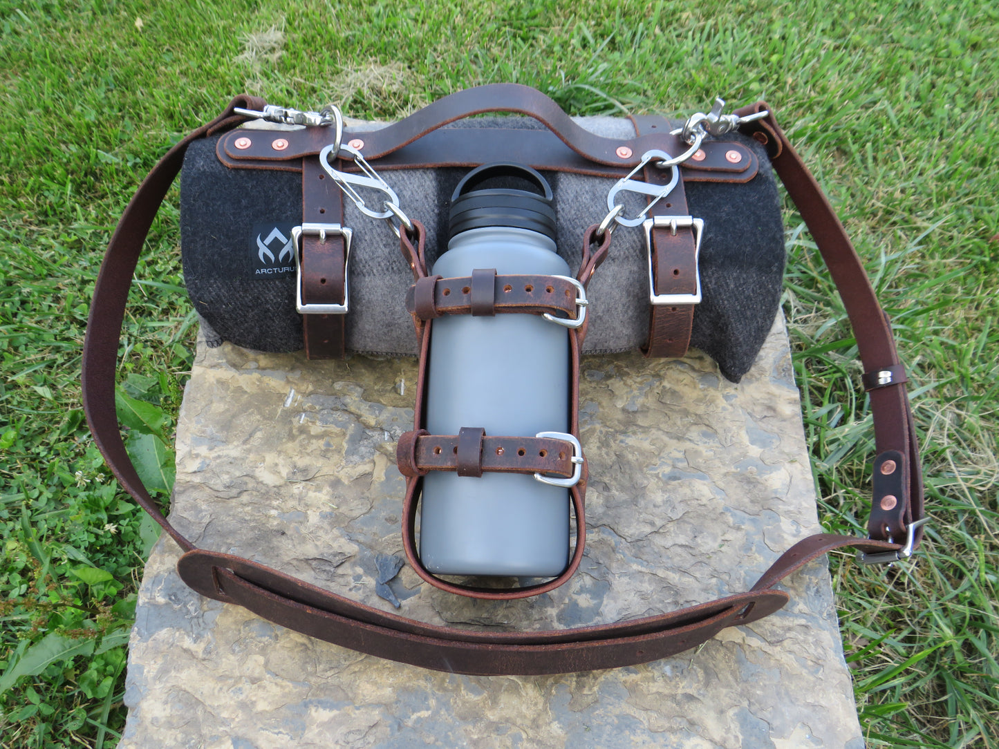 Hand made Crazy Horse Water Buffalo leather blanket carrier with matching water bottle carrier with wool blanket and bottle