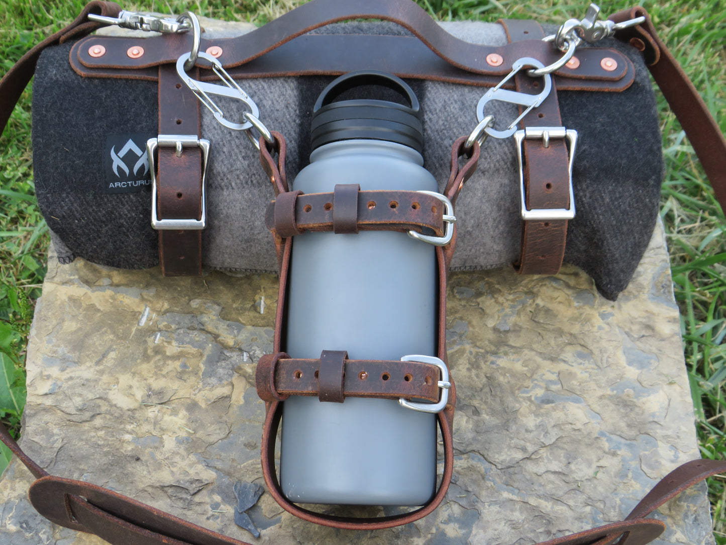 Hand made Crazy Horse Water Buffalo leather blanket carrier with matching water bottle carrier with wool blanket and bottle