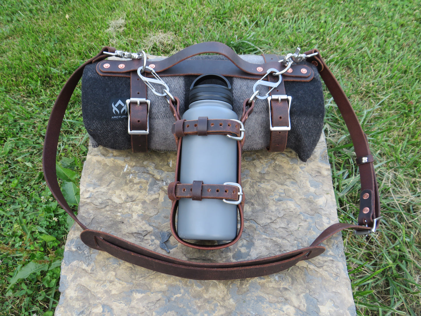 Hand made Crazy Horse Water Buffalo leather blanket carrier with matching water bottle carrier with wool blanket and bottle