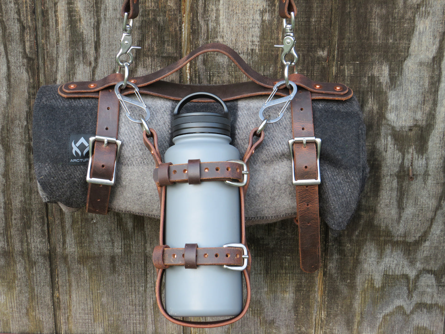 Hand made Crazy Horse Water Buffalo leather blanket carrier with matching water bottle carrier with wool blanket and bottle