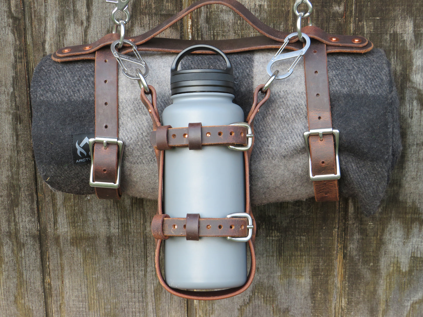 Hand made Crazy Horse Water Buffalo leather blanket carrier with matching water bottle carrier with wool blanket and bottle