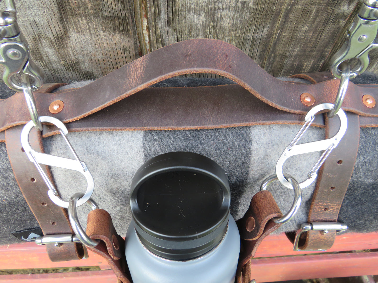 Hand made Crazy Horse Water Buffalo leather blanket carrier with matching water bottle carrier with wool blanket and bottle