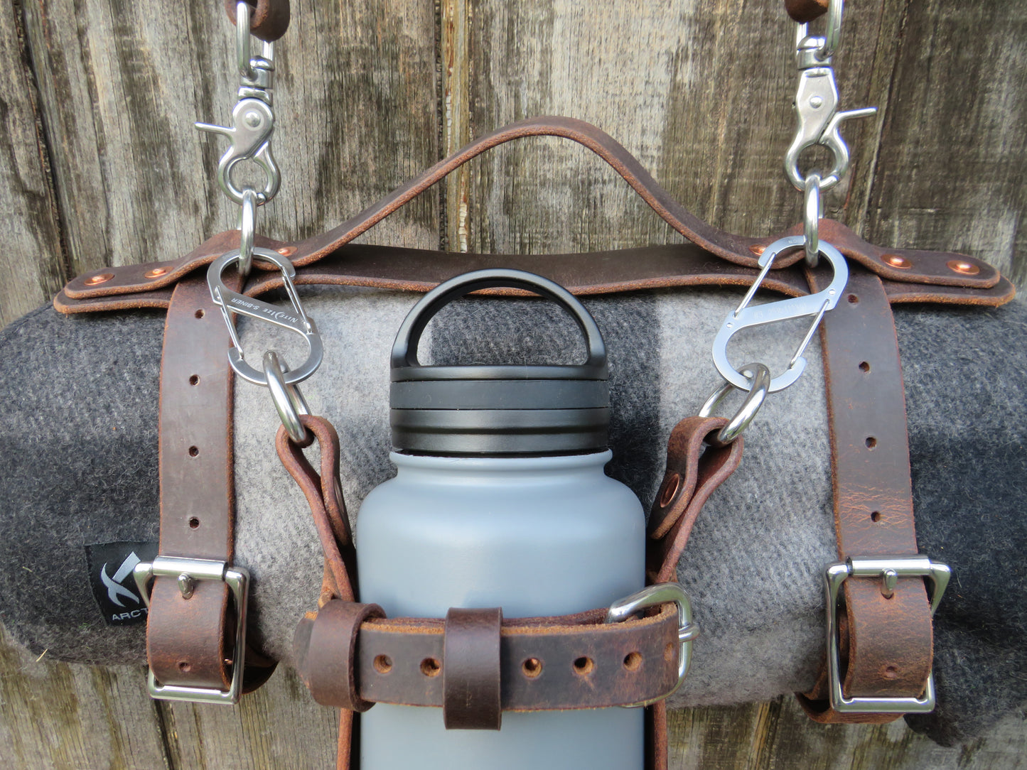 Hand made Crazy Horse Water Buffalo leather blanket carrier with matching water bottle carrier with wool blanket and bottle