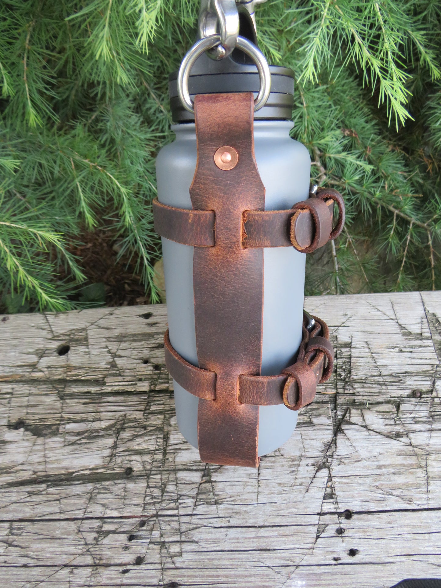 Hand made Crazy Horse Water Buffalo leather blanket carrier with matching water bottle carrier with wool blanket and bottle