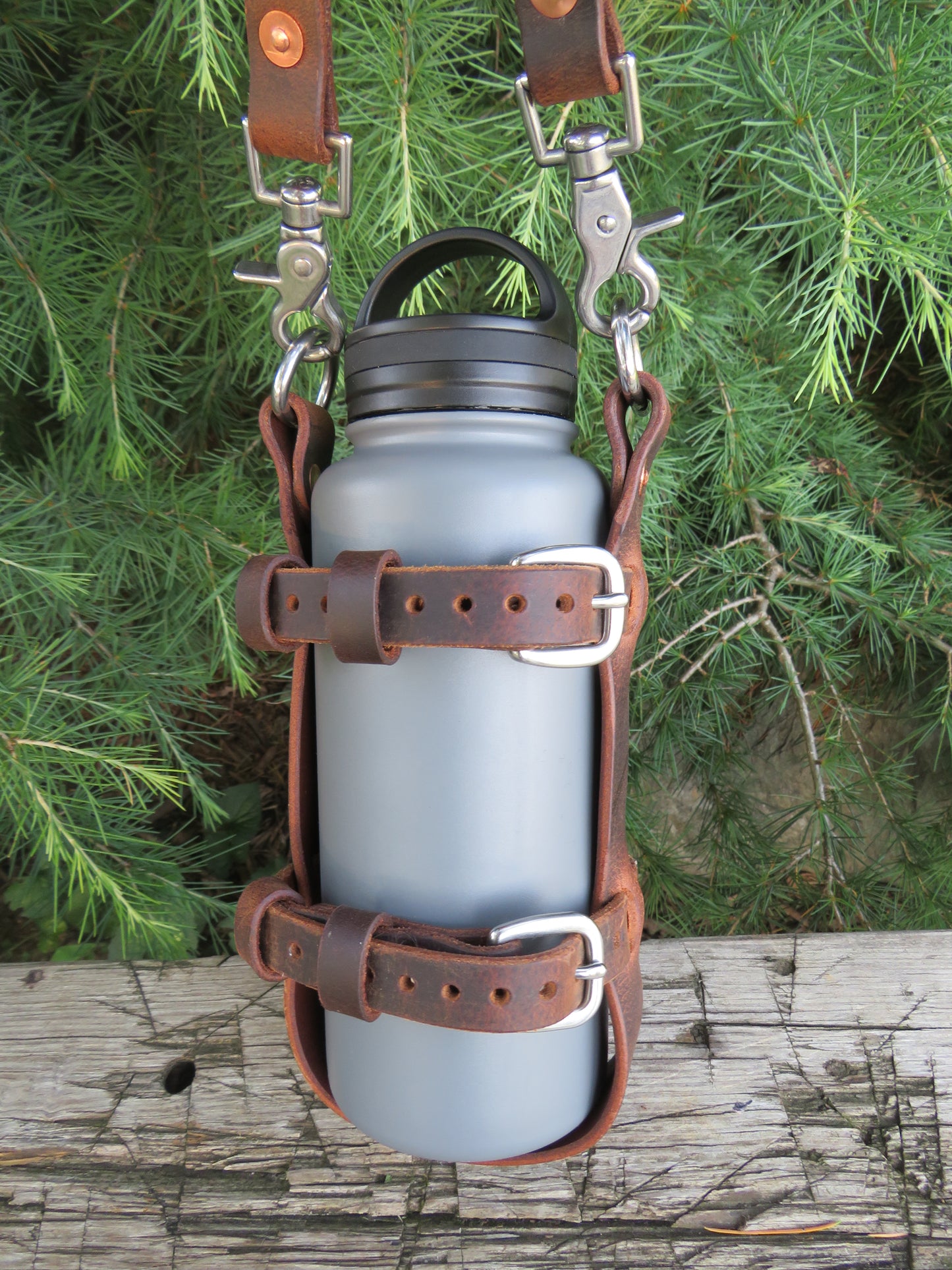 Hand made Crazy Horse Water Buffalo leather blanket carrier with matching water bottle carrier with wool blanket and bottle