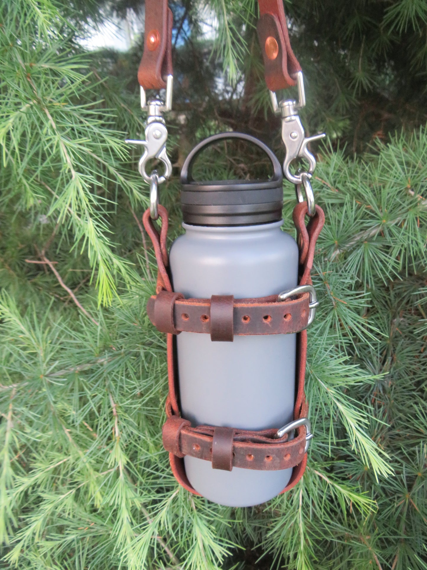 Hand made Crazy Horse Water Buffalo leather blanket carrier with matching water bottle carrier with wool blanket and bottle