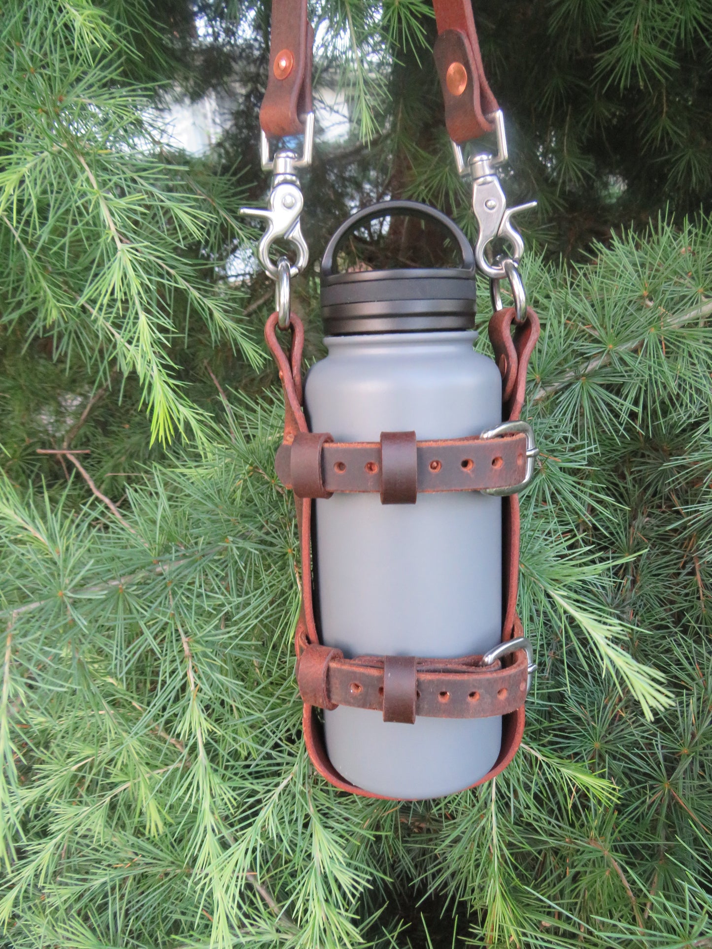 Hand made Crazy Horse Water Buffalo leather blanket carrier with matching water bottle carrier with wool blanket and bottle