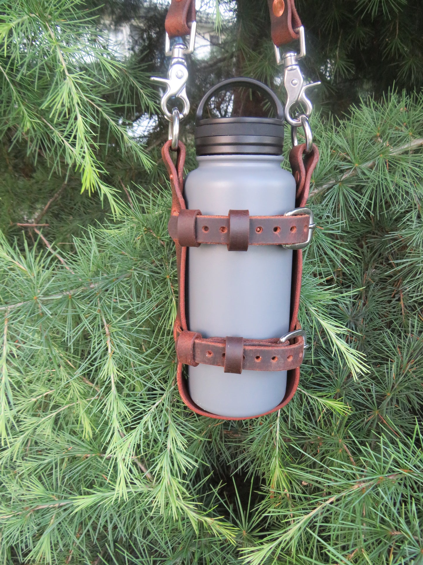 Hand made Crazy Horse Water Buffalo leather blanket carrier with matching water bottle carrier with wool blanket and bottle