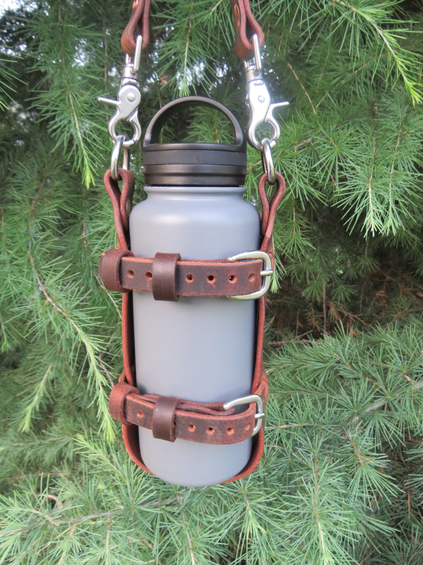 Hand made Crazy Horse Water Buffalo leather blanket carrier with matching water bottle carrier with wool blanket and bottle