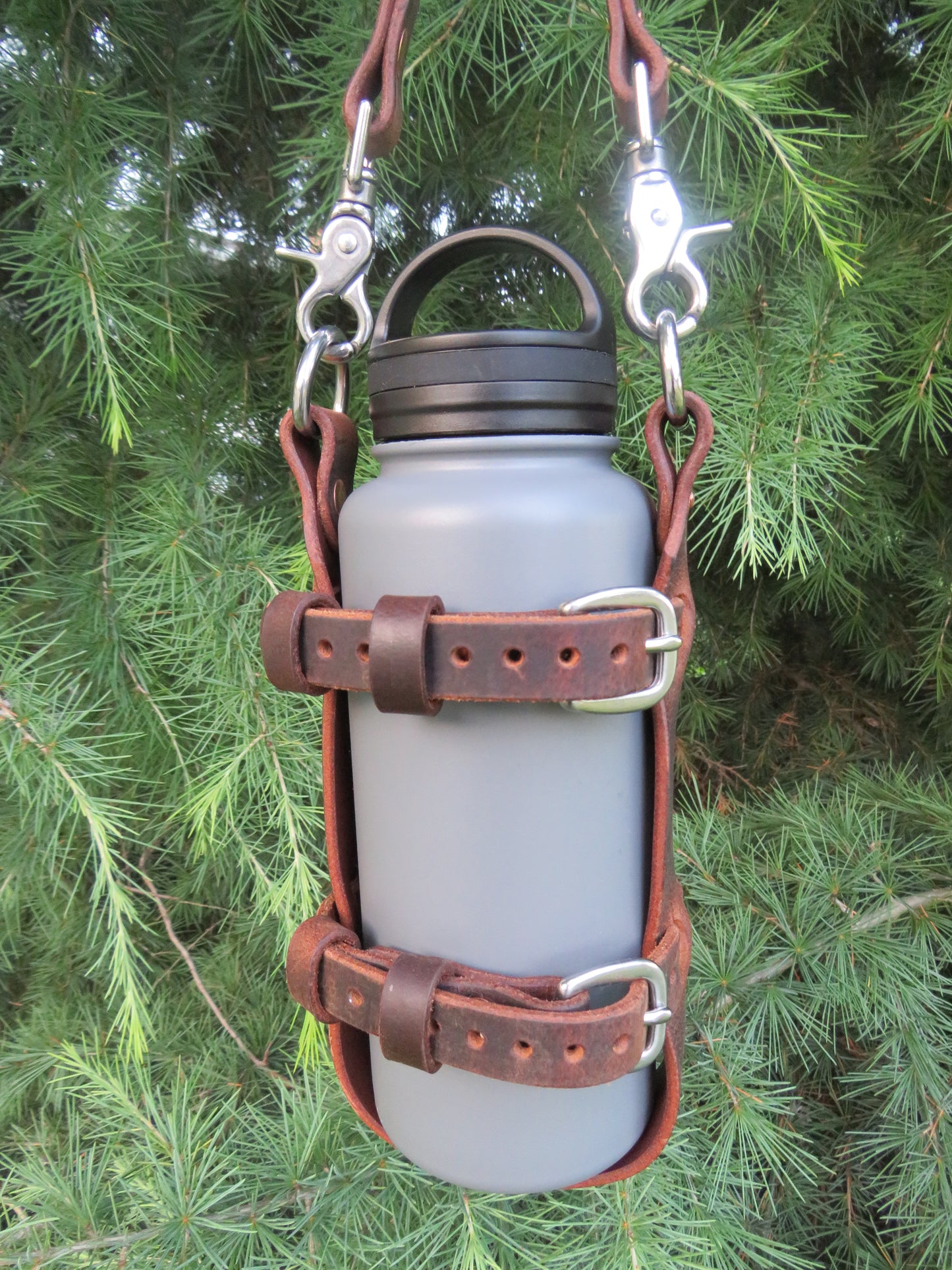 Hand made Crazy Horse Water Buffalo leather blanket carrier with matching water bottle carrier with wool blanket and bottle