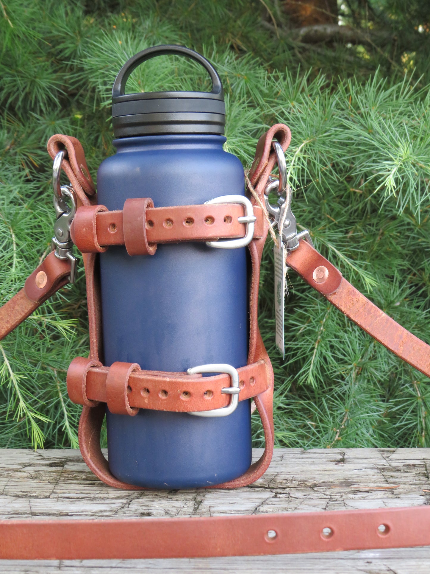 Hand made Hermann Oak harness leather blanket carrier with matching water bottle carrier