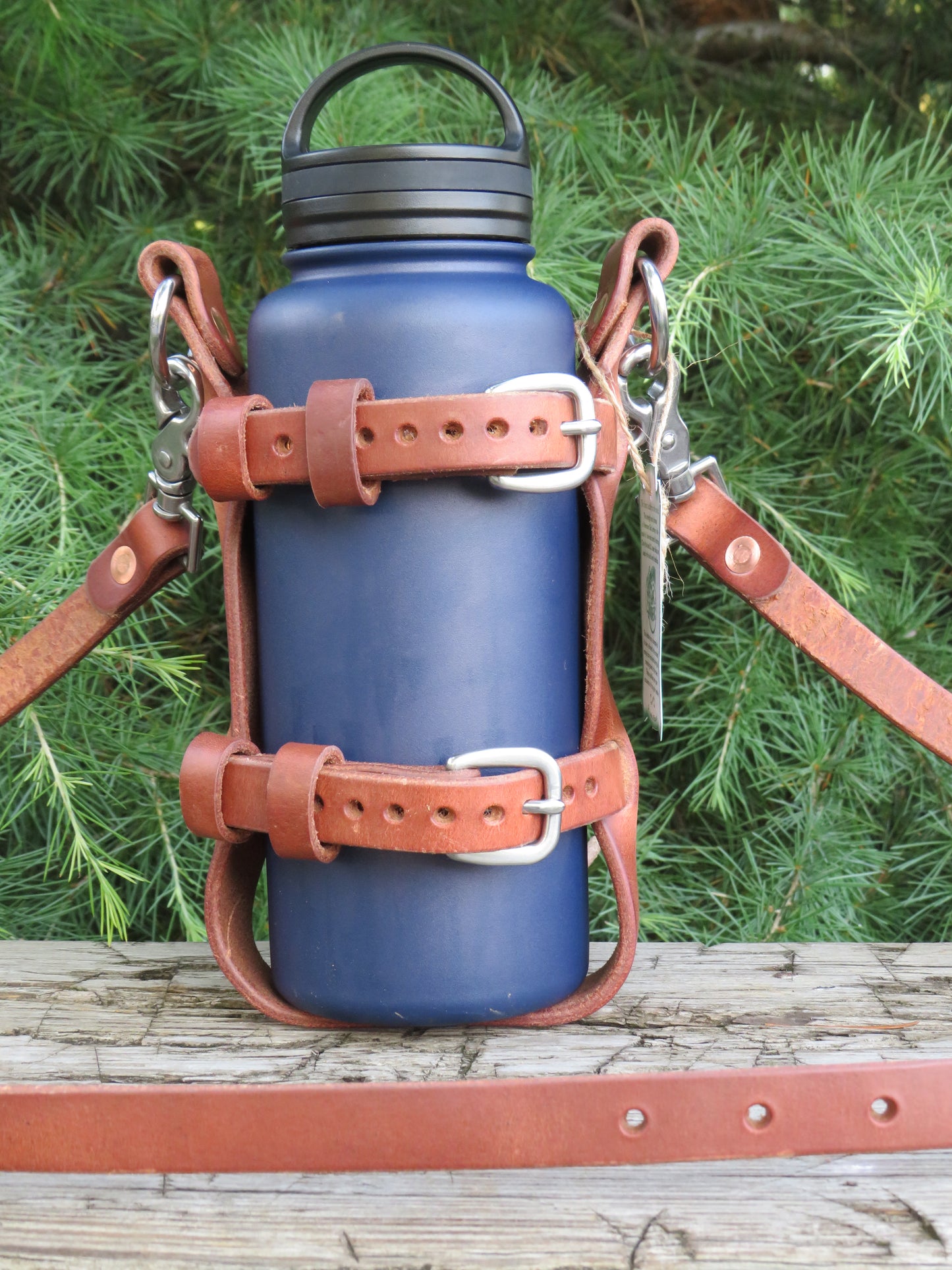 Hand made Hermann Oak harness leather blanket carrier with matching water bottle carrier