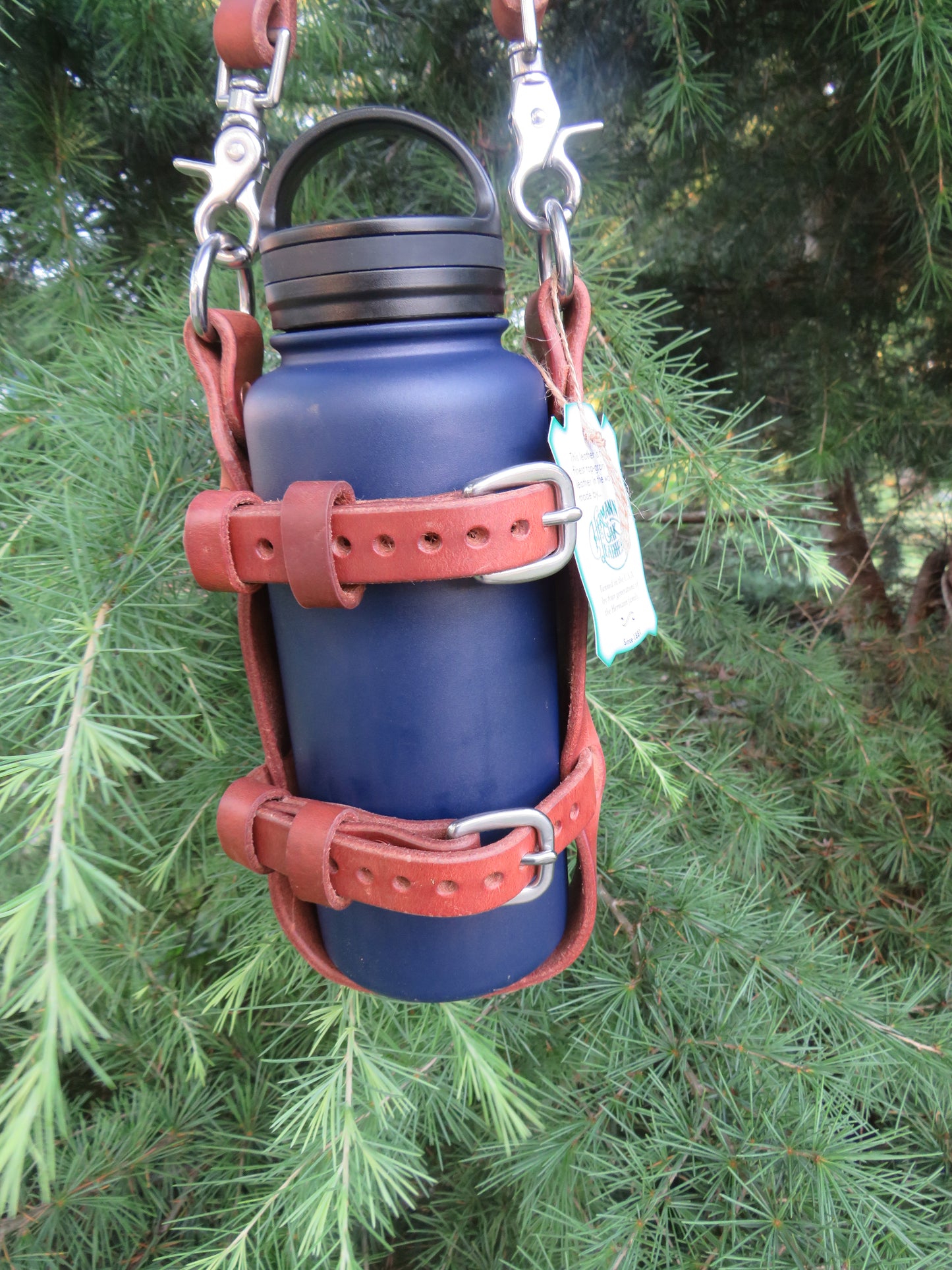 Hand made Hermann Oak harness leather blanket carrier with matching water bottle carrier