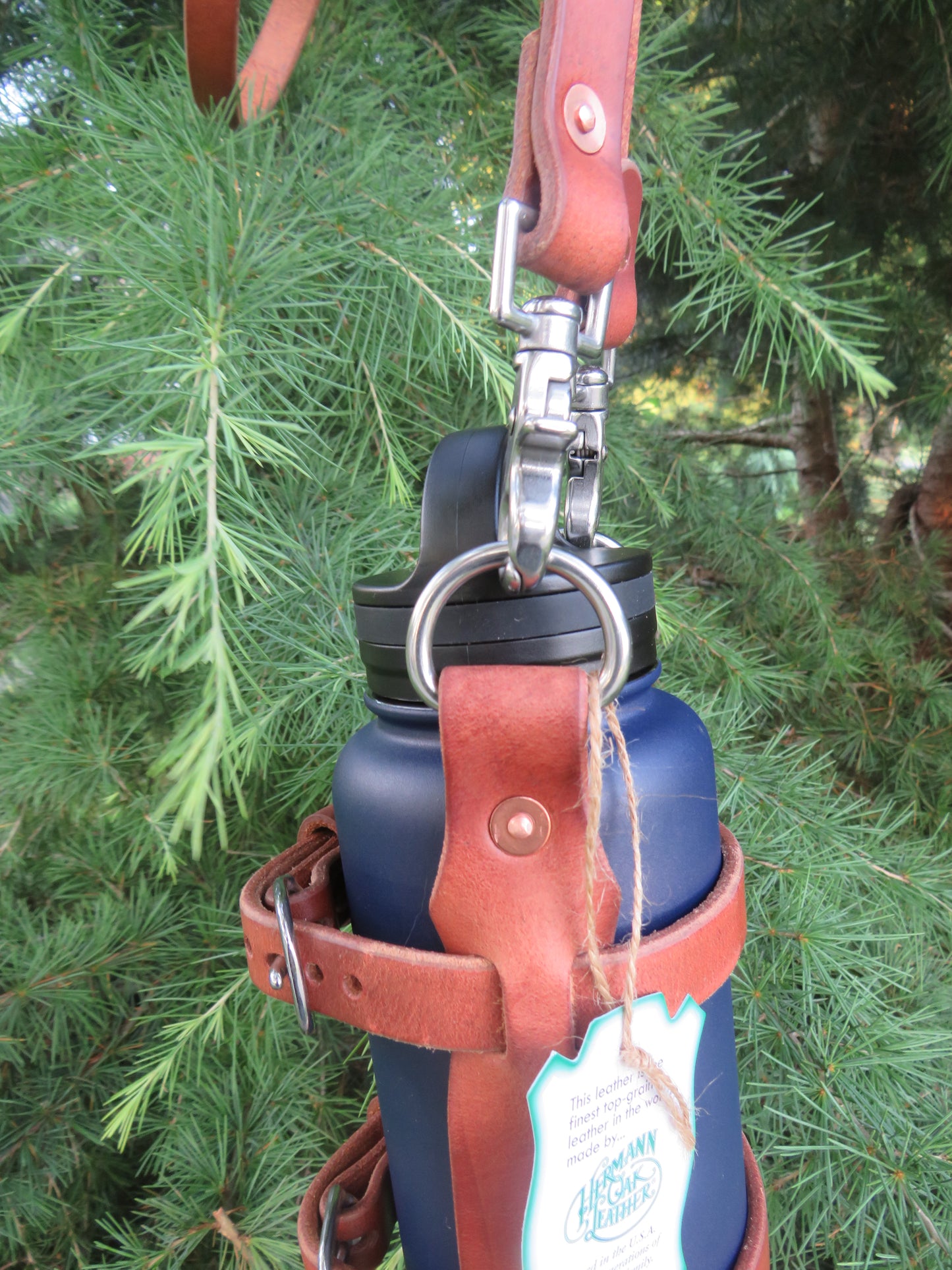 Hand made Hermann Oak harness leather blanket carrier with matching water bottle carrier