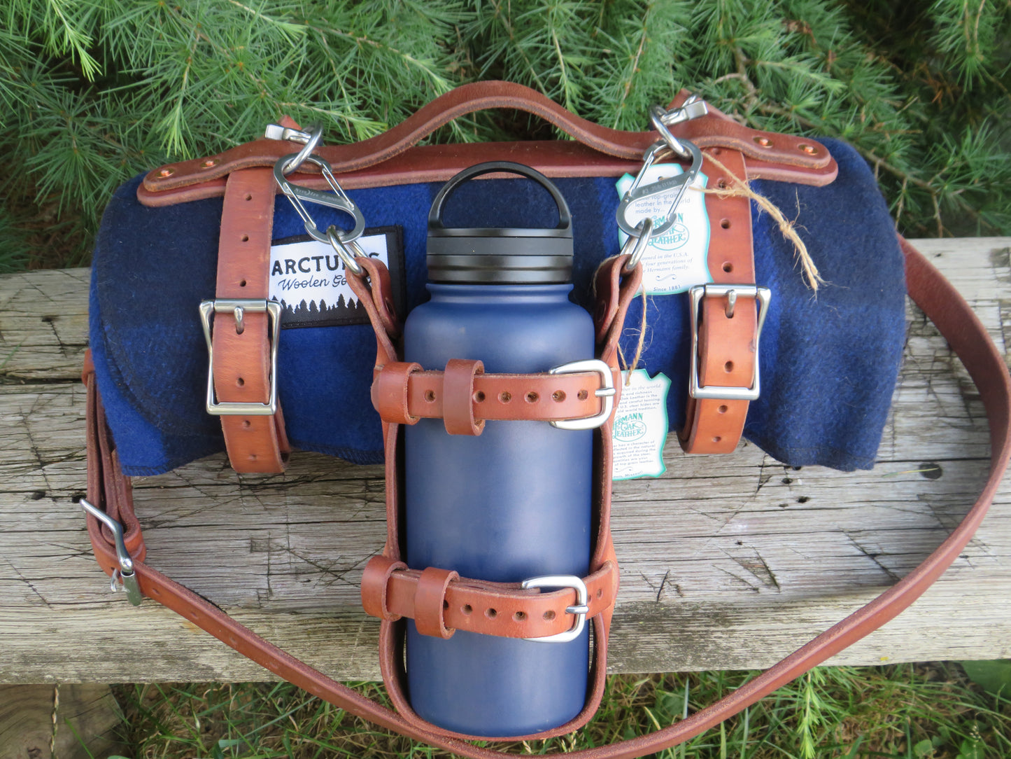 Hand made Hermann Oak harness leather blanket carrier with matching water bottle carrier