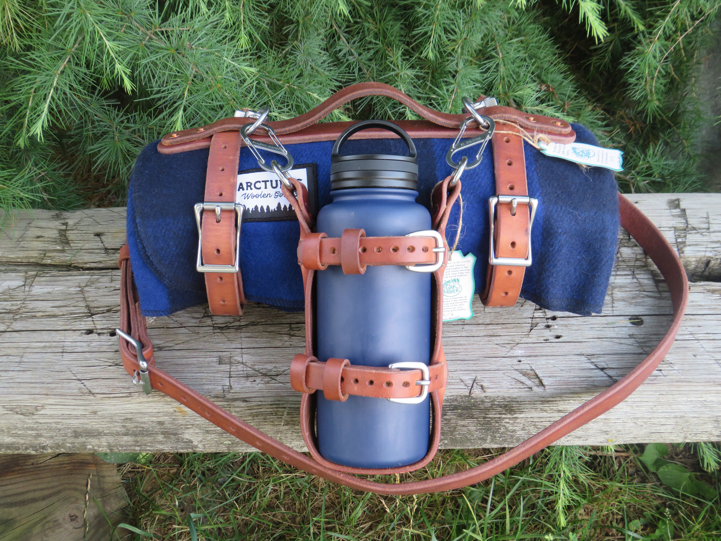 Hand made Hermann Oak harness leather blanket carrier with matching water bottle carrier