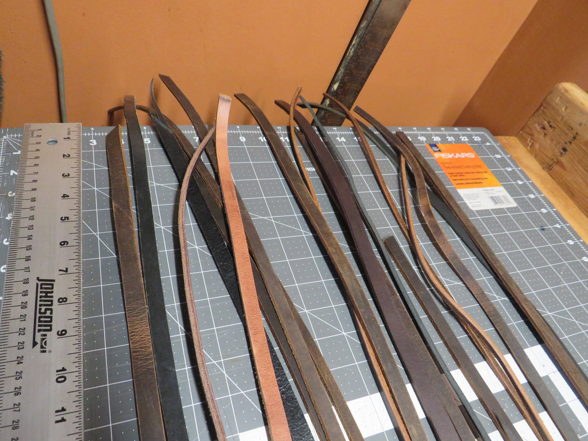3 pounds of veg tanned leather straps  1/2" and 1/4" wide