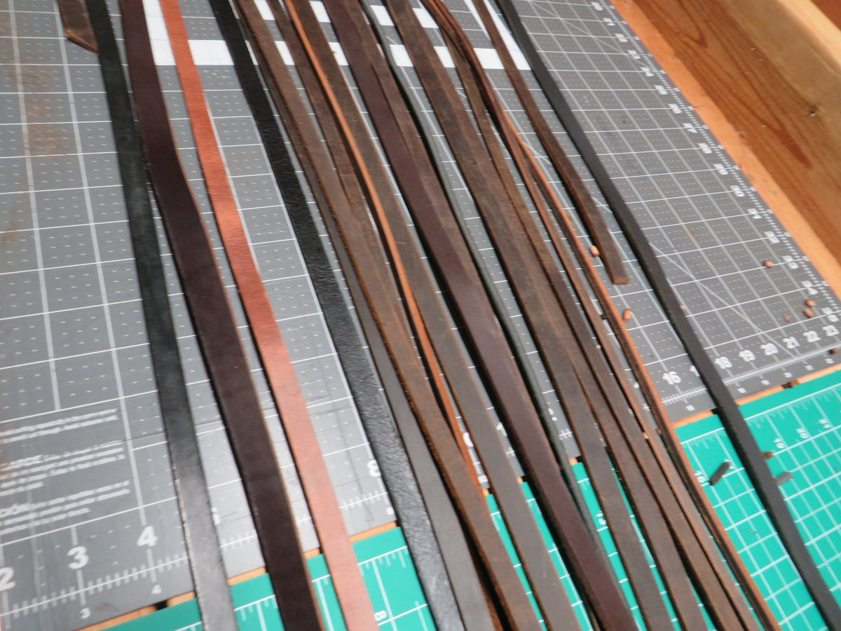 3 pounds of veg tanned leather straps  1/2" and 1/4" wide