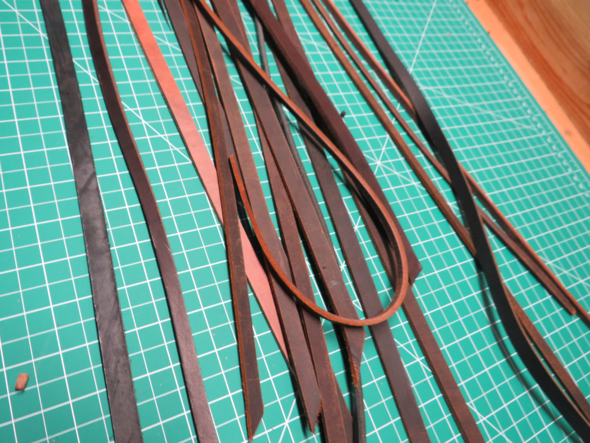 3 pounds of veg tanned leather straps  1/2" and 1/4" wide