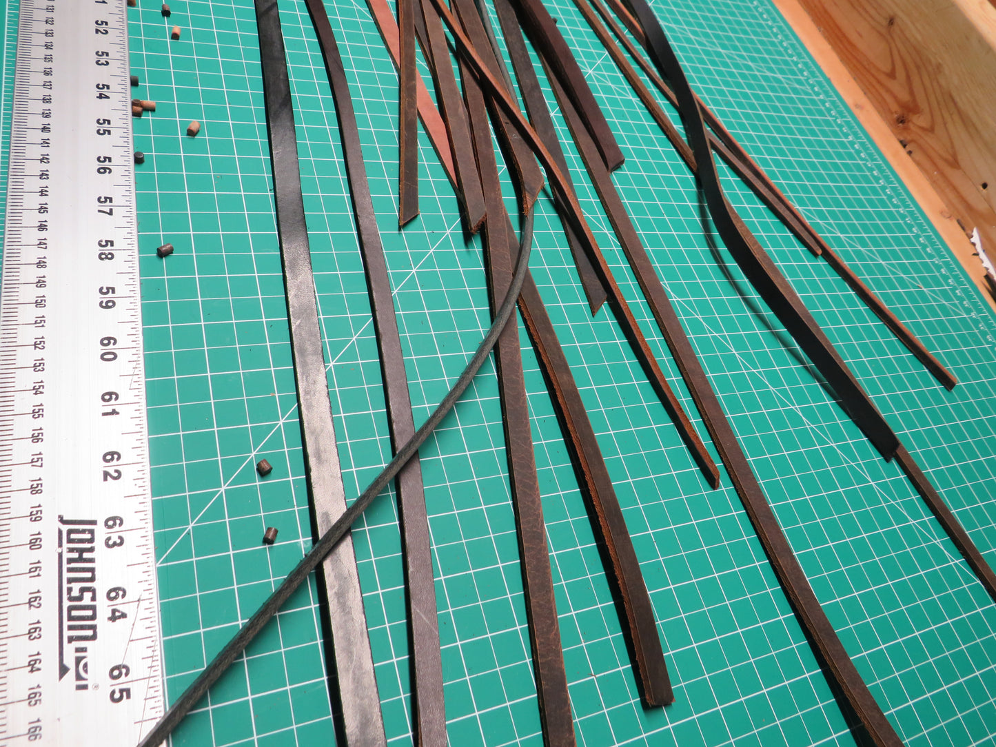 3 pounds of veg tanned leather straps  1/2" and 1/4" wide