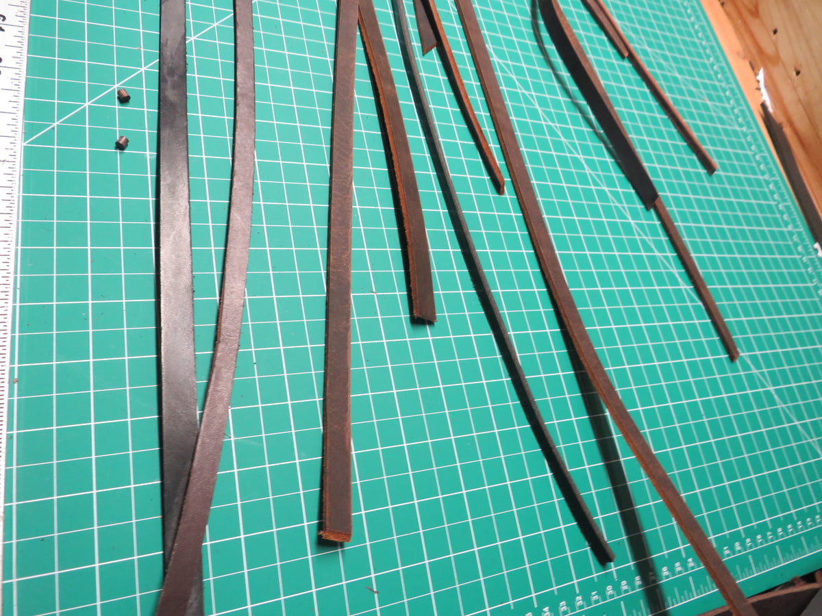 3 pounds of veg tanned leather straps  1/2" and 1/4" wide