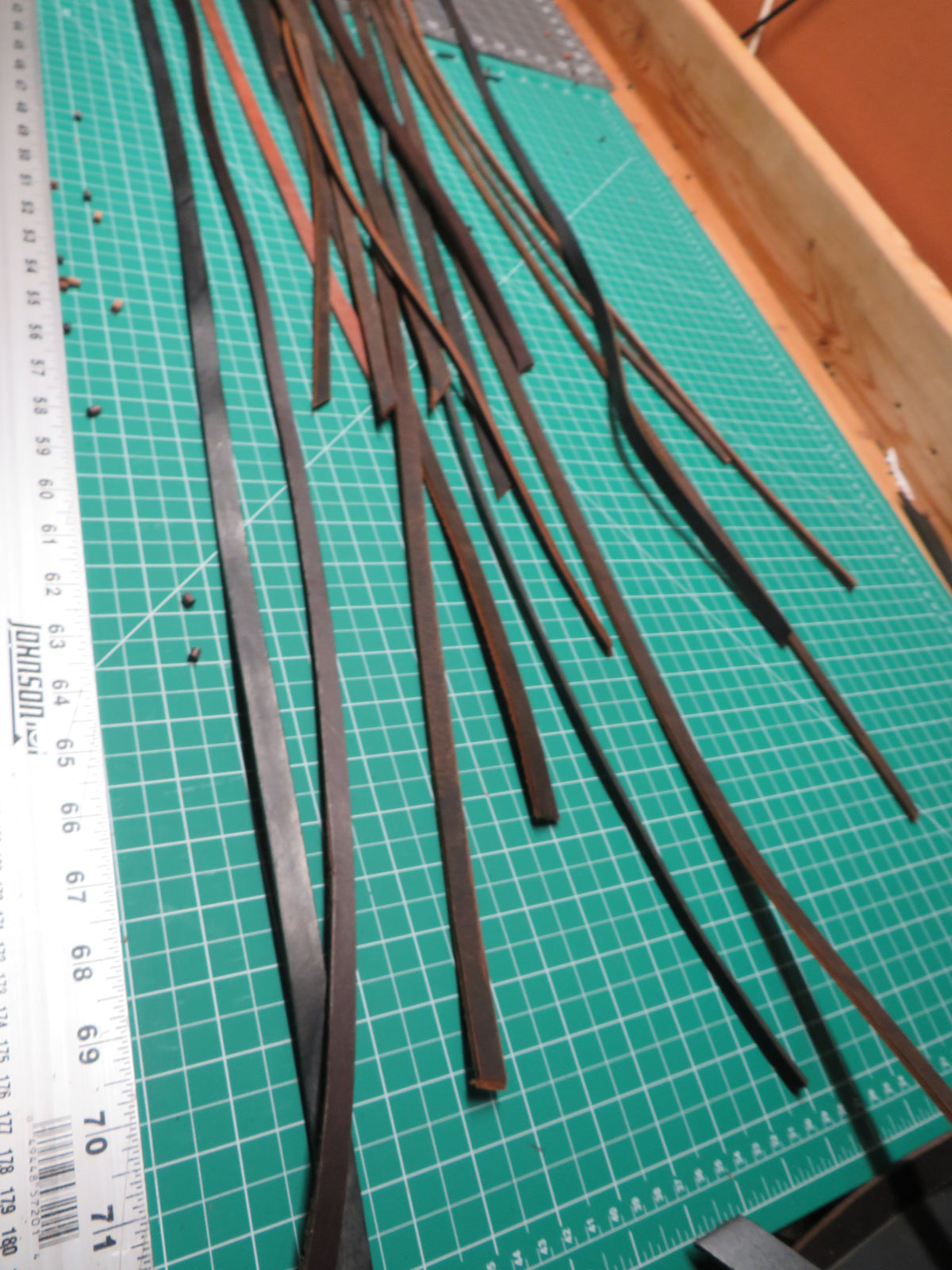 3 pounds of veg tanned leather straps  1/2" and 1/4" wide