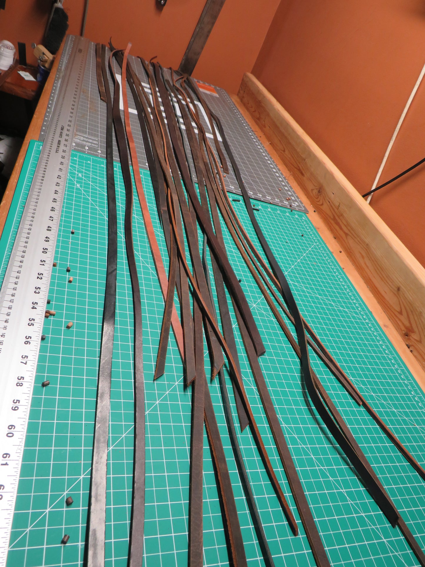 3 pounds of veg tanned leather straps  1/2" and 1/4" wide