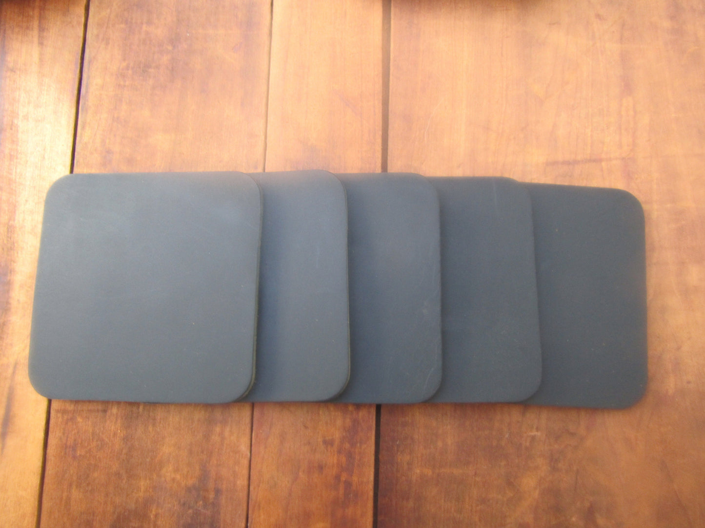 Ships today!! Set of 5 Black full grain Leather coasters, finish them your way, or use them like this