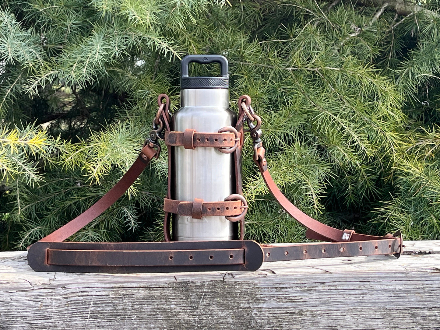 Adjustable Full Grain Water Buffalo leather water bottle carrier with shoulder strap, copper finish conchos & copper buckles , shoulder pad