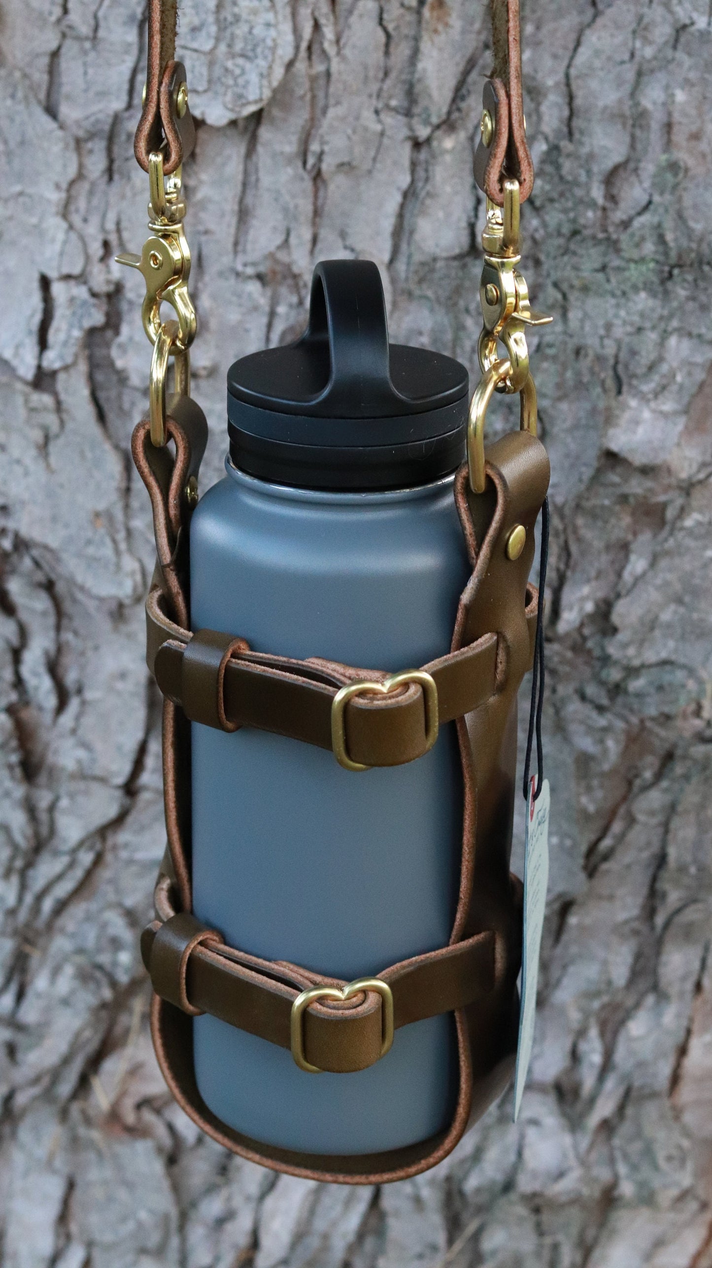 Adjustable leather water bottle carrier made with Full Grain Wickett and Craig Olive Green harness with shoulder strap Water Bottle harness