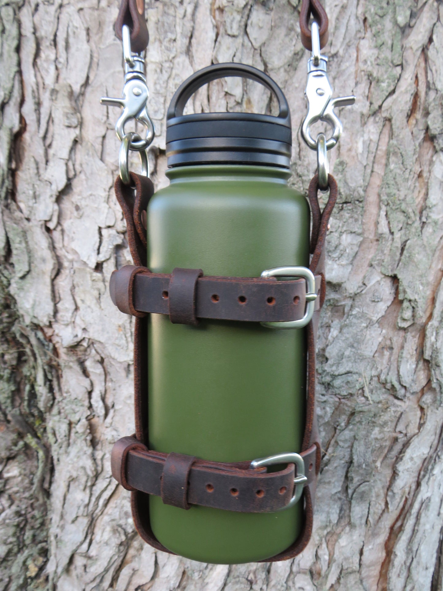 Adjustable Full Grain leather water bottle carrier with shoulder strap, Stainless Steel buckles and full grain leather custom made to fit