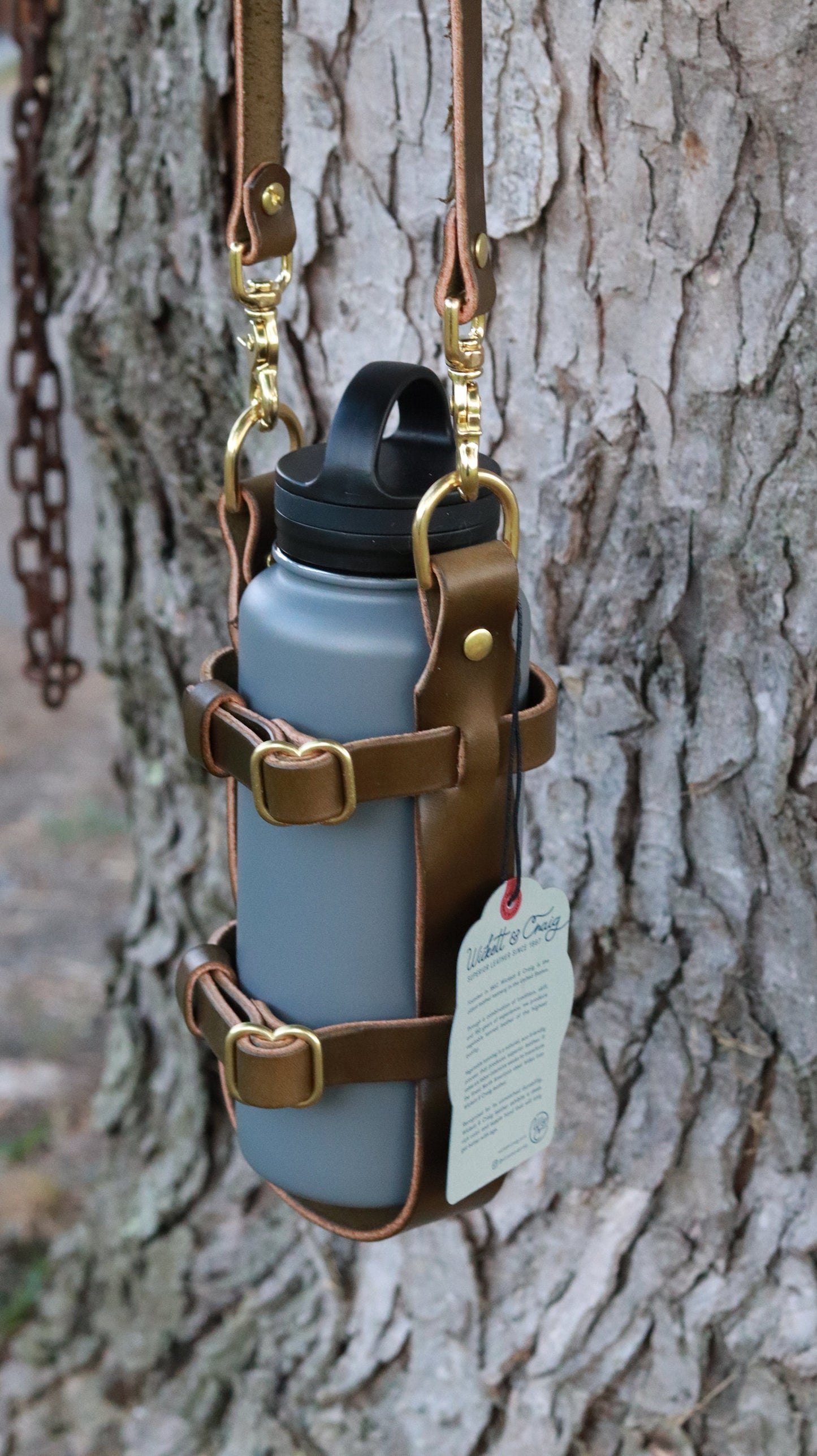 Adjustable leather water bottle carrier made with Full Grain Wickett and Craig Olive Green harness with shoulder strap Water Bottle harness