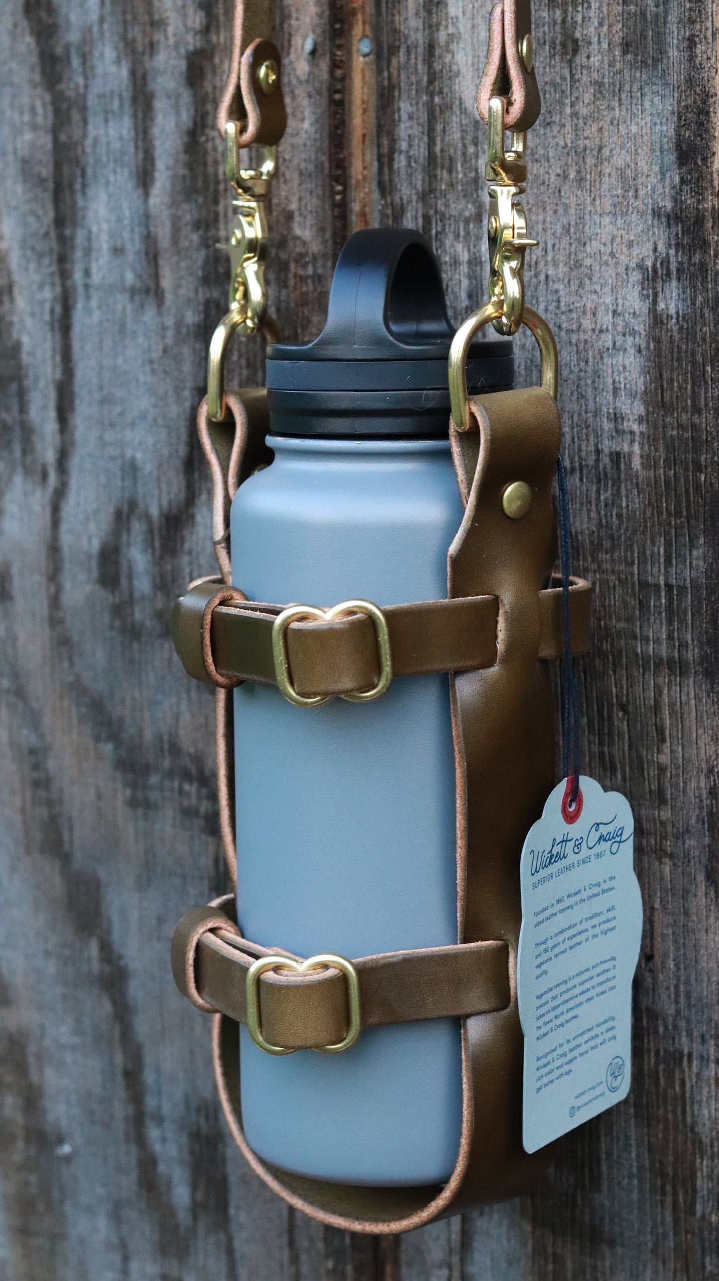 Adjustable leather water bottle carrier made with Full Grain Wickett and Craig Olive Green harness with shoulder strap Water Bottle harness